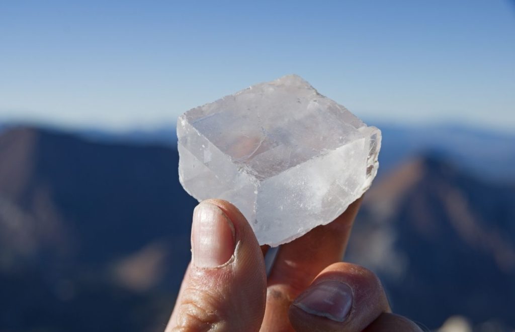 A Calcite crystal being held up