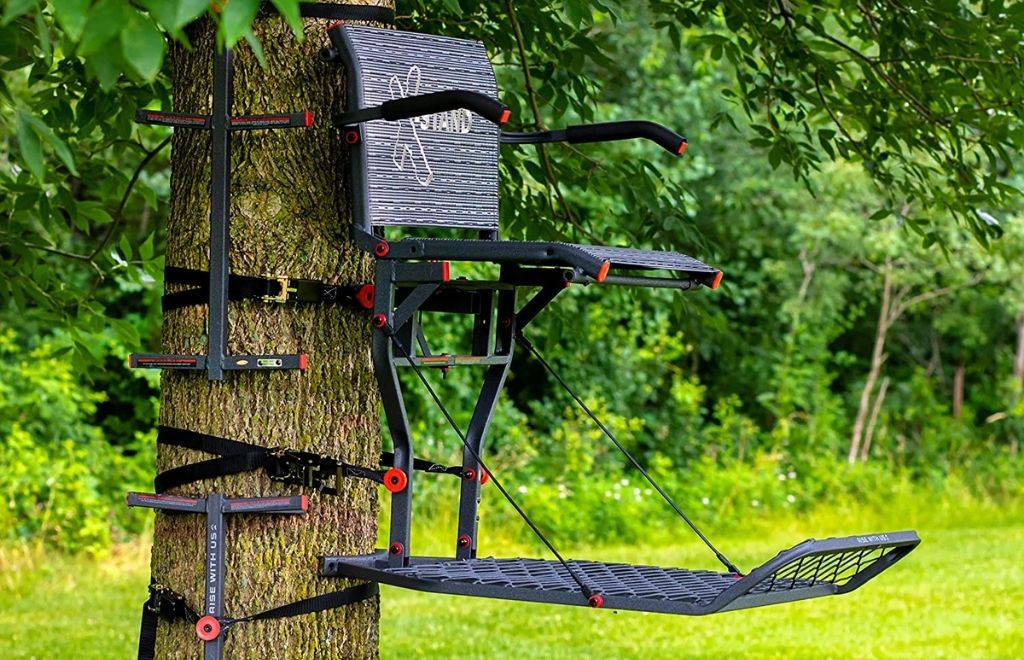 A hang-on treestand with trees is fully setup