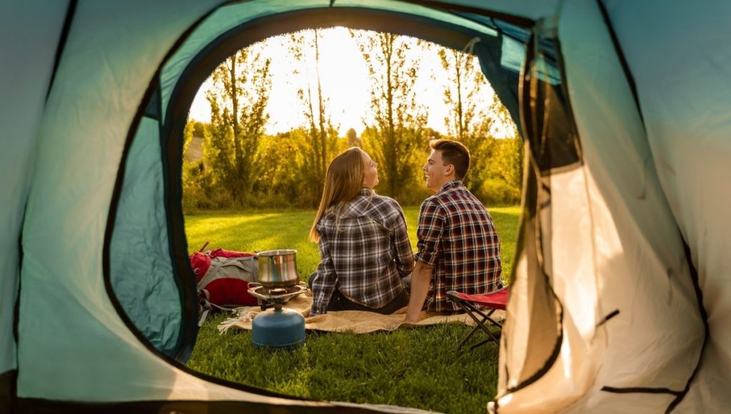 couple enjoying camping